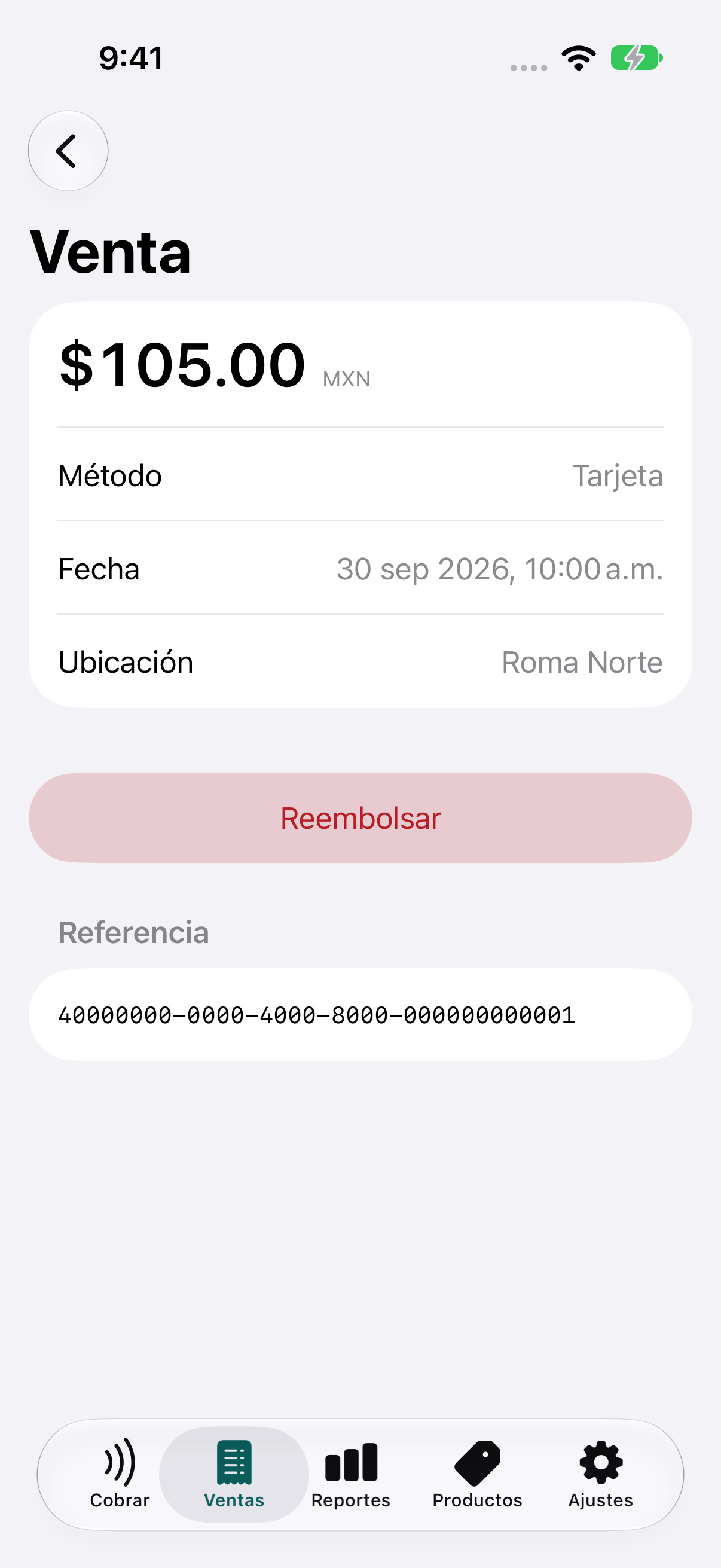 Detalle de una venta de ejemplo pagada con tarjeta, con importe, ubicación y referencia.